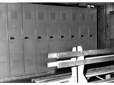Black and white photo of Novitiate locker room.