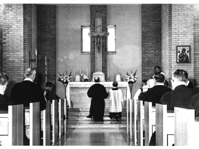 Black and white photo of a service held at the Novitiate chapel.