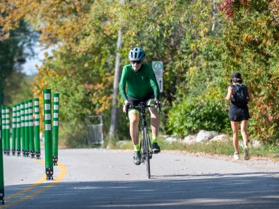 Cyclist and runner using the Multi-use Pathway